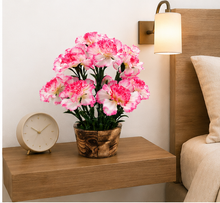 Artificial Long Carnation in circular wooden pot ( Height : 35 x Width : 24 )