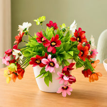 Daily flowers on 1.5 bunch latex on 31 point topiary in 5" emrald pot