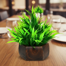 Artificial Leaves Plant with Wood Hexagon Pot ( Height 16.5 cm)