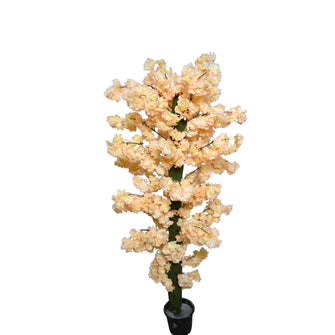 4 feet Artificial Flower plant in black pot placed  in the corner of living room