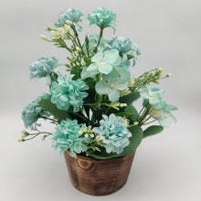 Artificial Carnation leaf bunch in designer pot ( Height : 24 x Width : 20 )