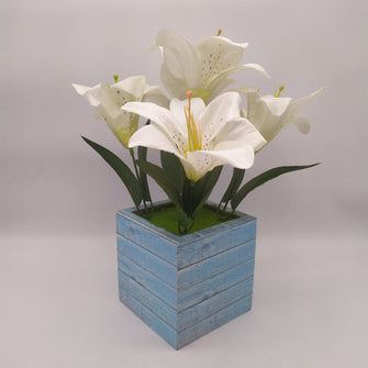 Artificial Lily flower bunch in designer pot ( Height : 27 x Width : 22 )