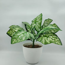 Artificial 9 leaves plant in white pot ( Height : 32 x Width : 26 )